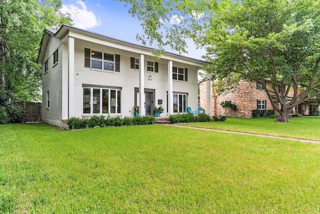 view of front of property with a front lawn