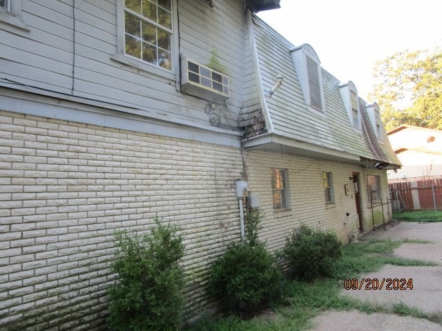 view of home's exterior featuring cooling unit