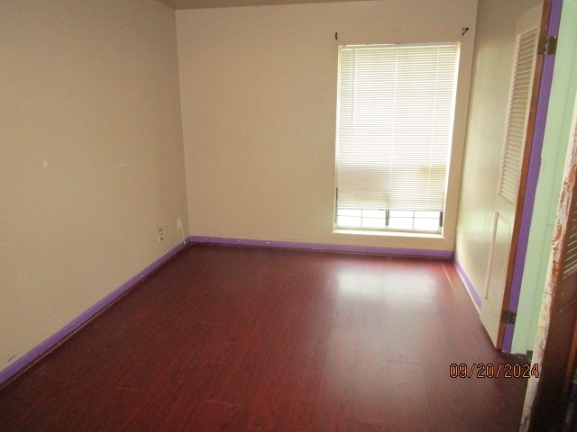 empty room featuring hardwood / wood-style floors