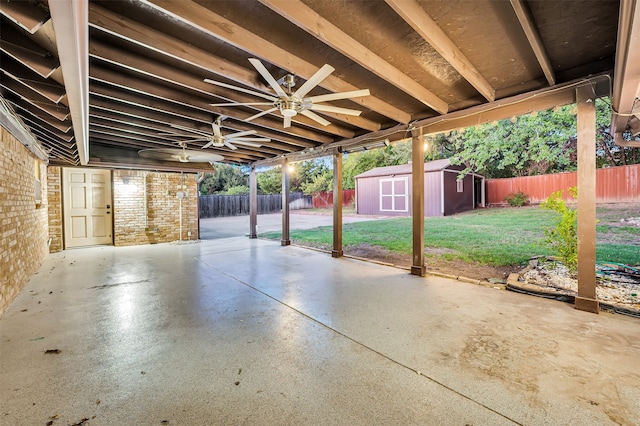 view of patio / terrace with a storage shed