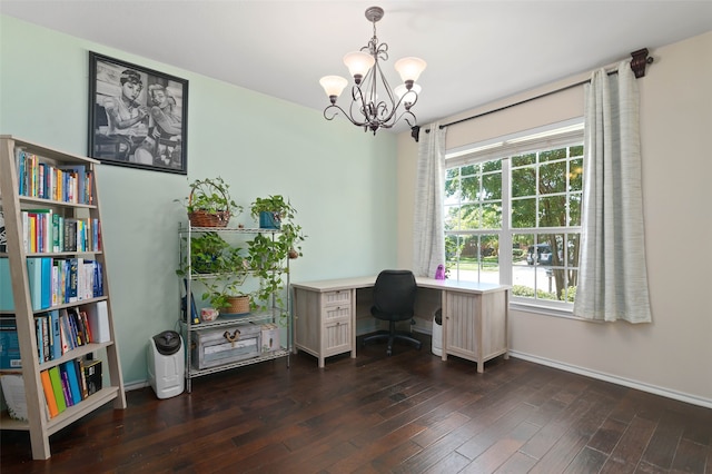 office space with an inviting chandelier and dark hardwood / wood-style flooring