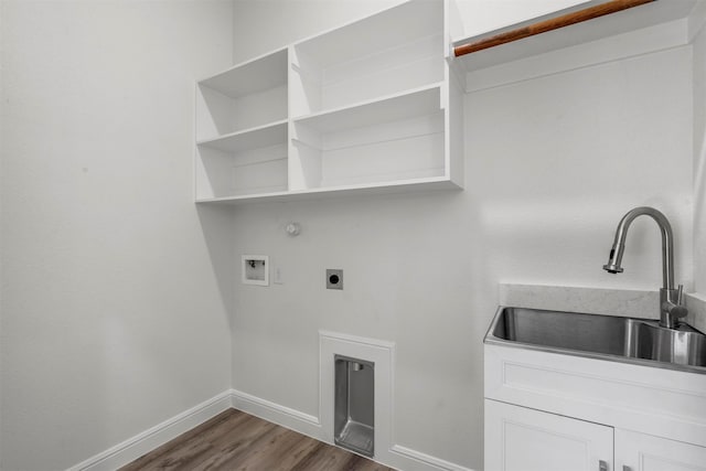 laundry room with cabinets, hookup for an electric dryer, dark wood-type flooring, sink, and hookup for a washing machine