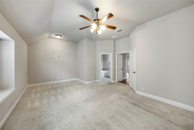 living room featuring a fireplace, dark hardwood / wood-style flooring, ceiling fan, and lofted ceiling