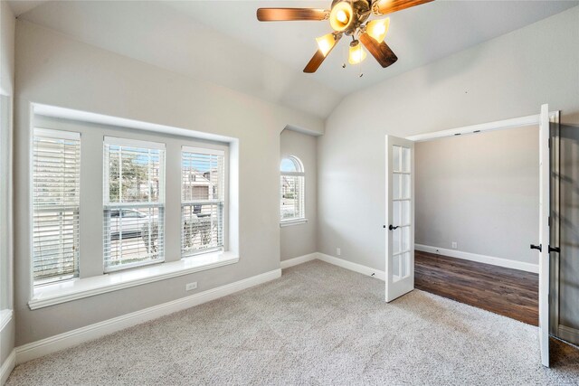 office with ceiling fan and light colored carpet