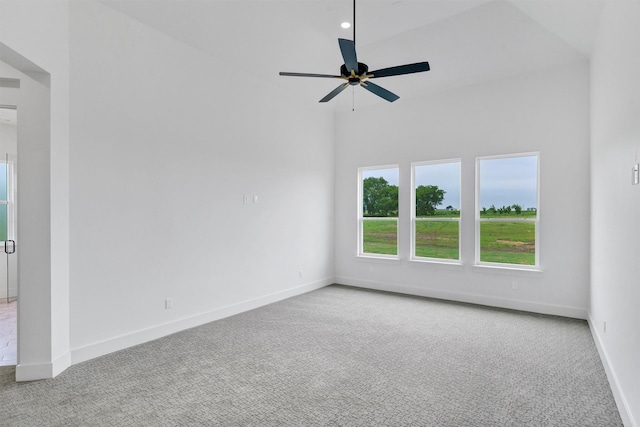 5360 Moncrief Rd, Justin, TX 76247 - carpeted empty room with baseboards and a ceiling fan
