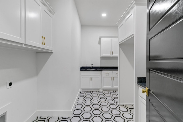 5360 Moncrief Rd, Justin, TX 76247 - washroom with laundry area, a sink, recessed lighting, baseboards, and electric dryer hookup