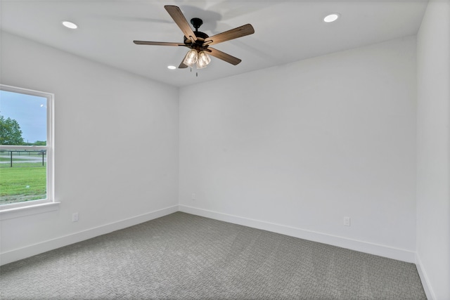 unfurnished room featuring carpet and ceiling fan