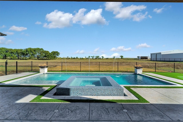 view of swimming pool featuring a lawn, an in ground hot tub, and pool water feature