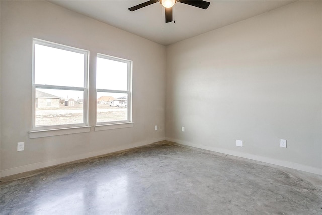 unfurnished room with ceiling fan