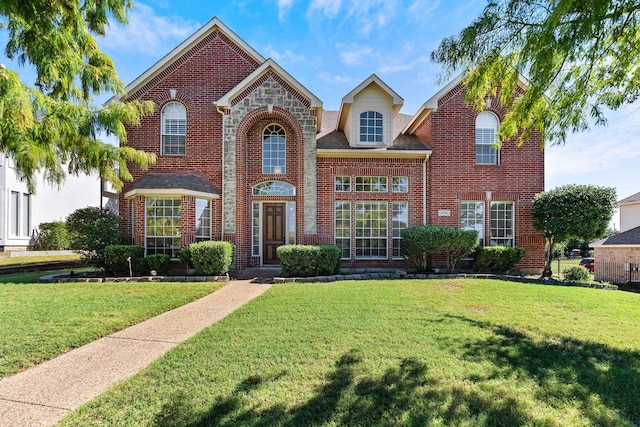 view of front facade with a front lawn