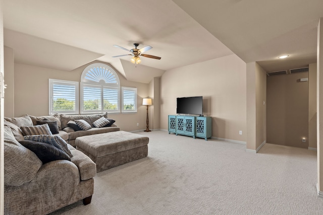 living room with light carpet, ceiling fan, and lofted ceiling