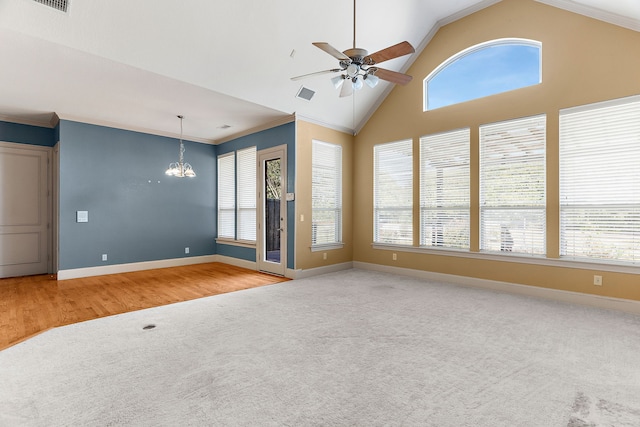 unfurnished living room with ornamental molding, a healthy amount of sunlight, and light wood-type flooring