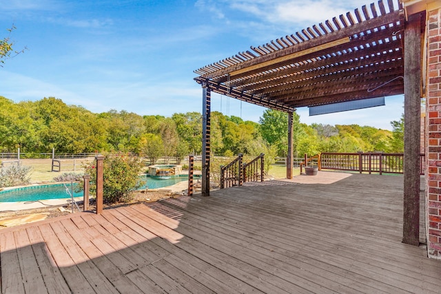 deck with a fenced in pool and a pergola