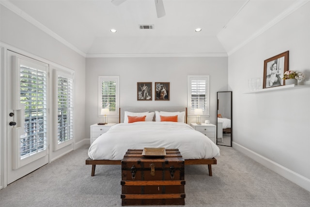 bedroom featuring lofted ceiling, multiple windows, and access to outside