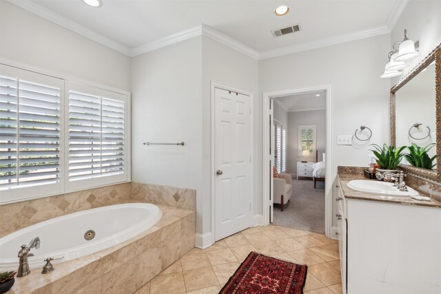 bathroom with vanity, tiled bath, plenty of natural light, and crown molding