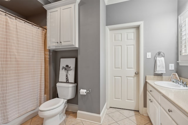 bathroom featuring vanity, toilet, a shower with shower curtain, and tile patterned floors