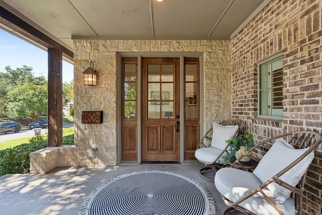 property entrance featuring a porch