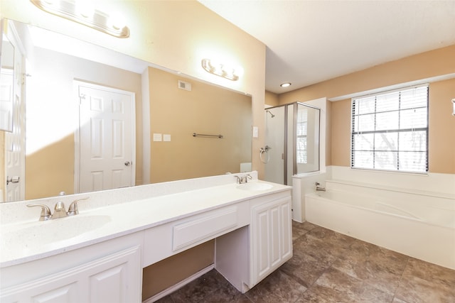 bathroom featuring shower with separate bathtub and vanity