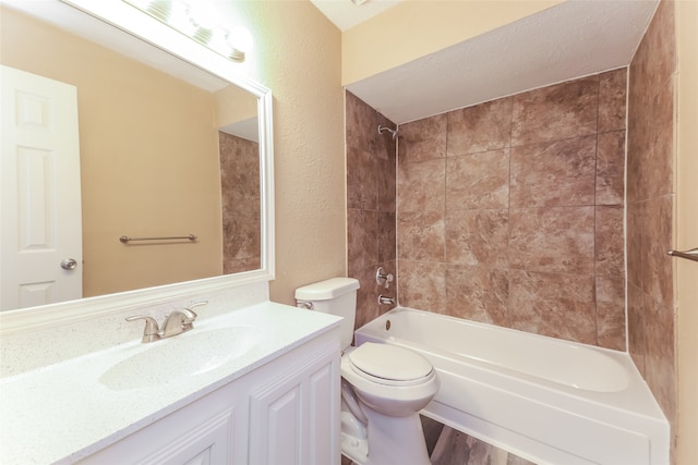 full bathroom featuring tiled shower / bath combo, vanity, toilet, and hardwood / wood-style floors