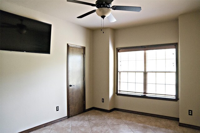 7226 County Road 1504, Athens, TX 75751 - spare room with plenty of natural light, a ceiling fan, and baseboards