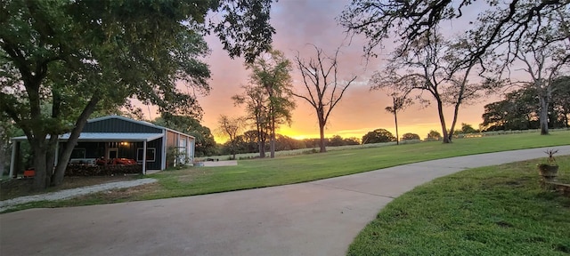 surrounding community featuring a yard