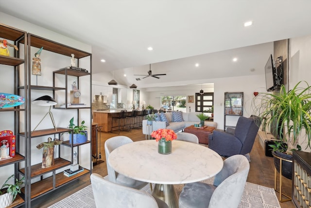 dining area with dark hardwood / wood-style floors and ceiling fan