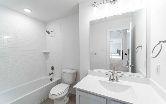 full bathroom featuring tiled shower / bath combo, toilet, and vanity