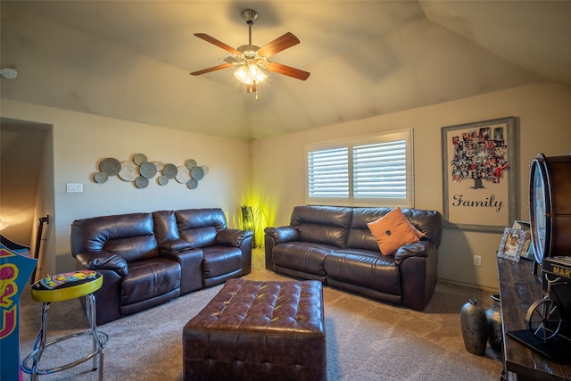 living room with vaulted ceiling, ceiling fan, and carpet floors