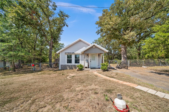 view of front of property with a front lawn