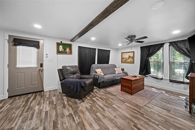 living room featuring ceiling fan, beamed ceiling, and hardwood / wood-style flooring