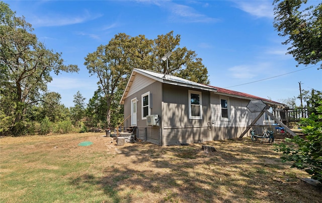 exterior space with a yard