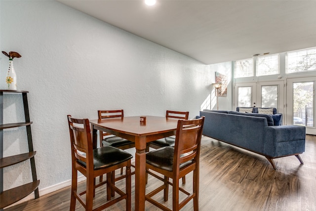 dining room with hardwood / wood-style floors