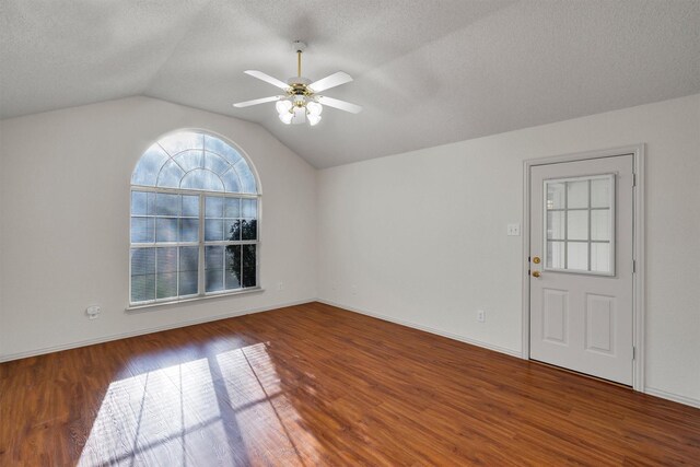 bathroom featuring vanity, tile patterned floors, a textured ceiling, and plus walk in shower