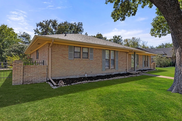 view of property exterior featuring a yard