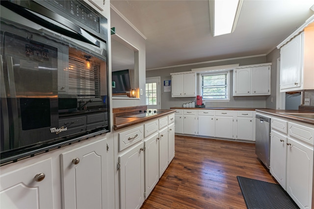 kitchen with black appliances, ornamental molding, dark hardwood / wood-style flooring, and white cabinetry