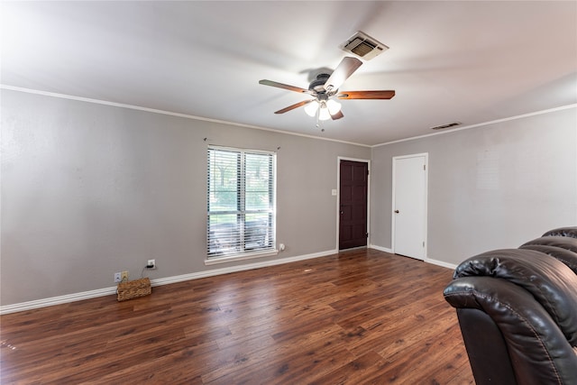 living room with ceiling fan, crown molding, and dark hardwood / wood-style flooring