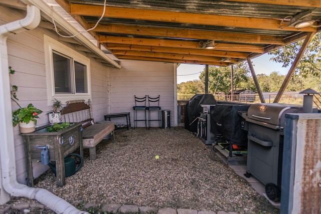 view of patio featuring a grill