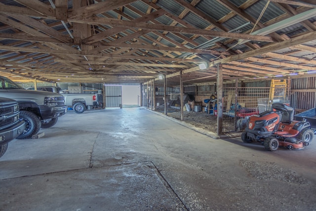 garage featuring a carport