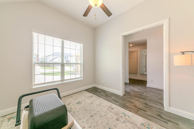 sitting room featuring lofted ceiling, hardwood / wood-style flooring, and ceiling fan