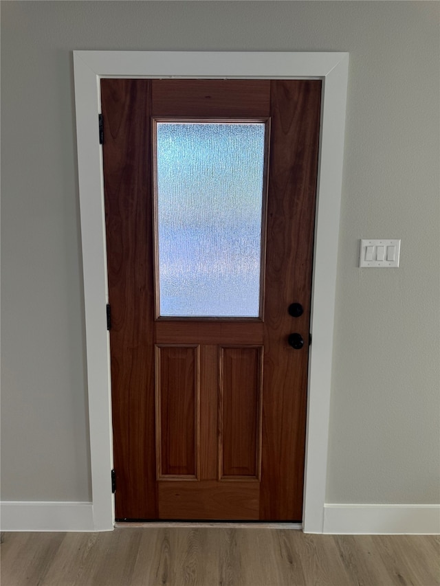 doorway featuring light wood-type flooring