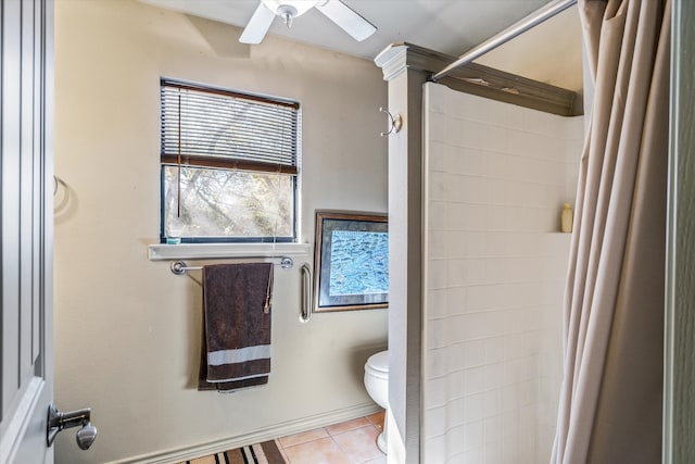 bathroom featuring tile patterned flooring, a shower with shower curtain, ceiling fan, and toilet