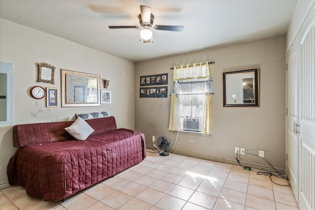 tiled bedroom featuring ceiling fan and cooling unit