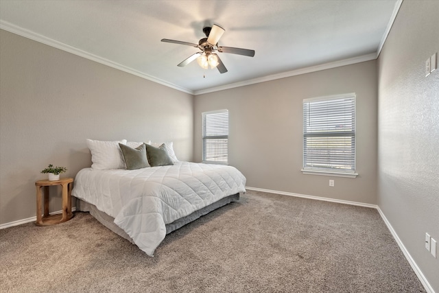 carpeted bedroom featuring multiple windows, crown molding, and ceiling fan