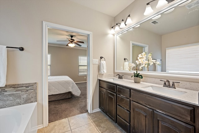 bathroom with crown molding, tile patterned flooring, vanity, and ceiling fan