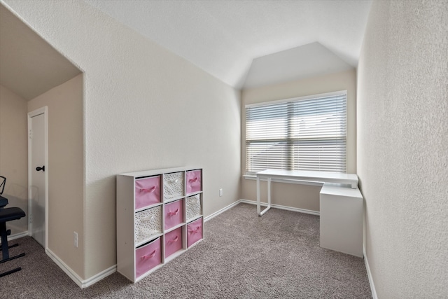 playroom featuring carpet and vaulted ceiling