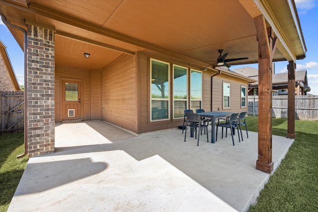 view of patio featuring ceiling fan