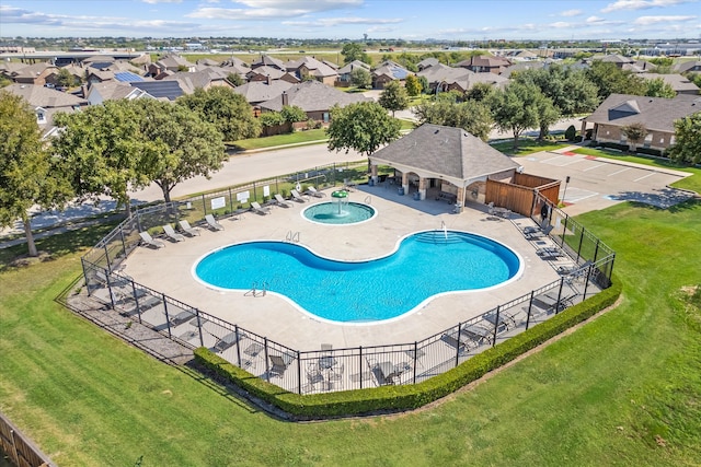 view of swimming pool with a gazebo, a yard, a patio, and a hot tub