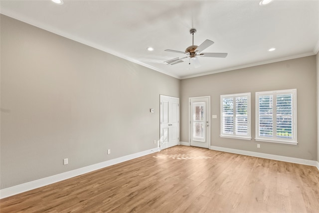 unfurnished room with ceiling fan, ornamental molding, and light hardwood / wood-style flooring