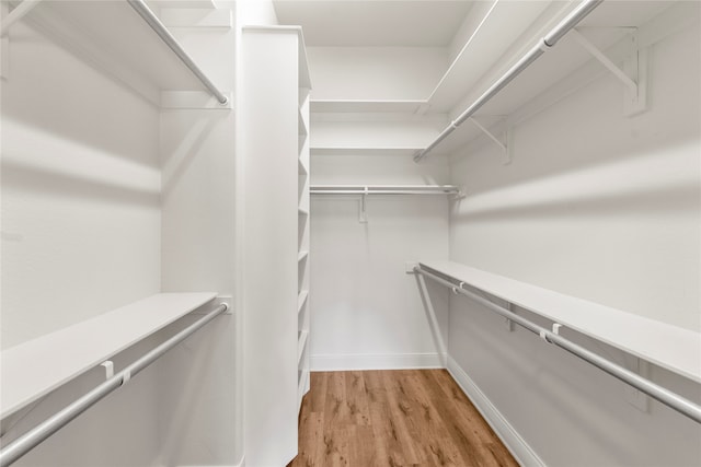 walk in closet featuring light wood-type flooring