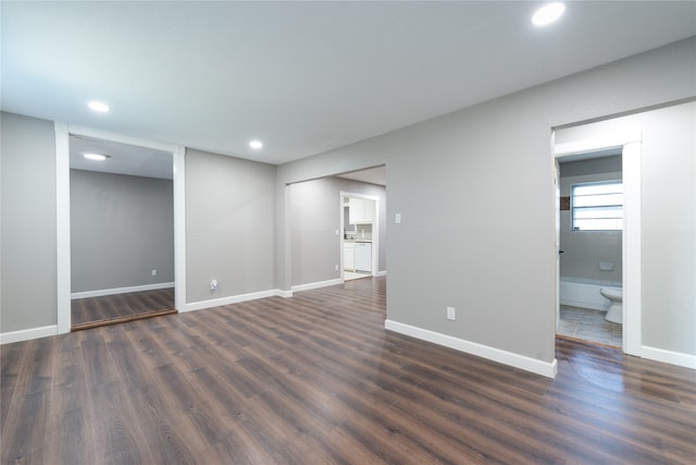 empty room featuring dark wood-type flooring